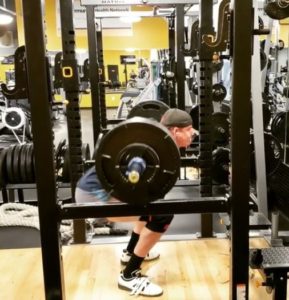 6 foot 9 power lifter squat bottom